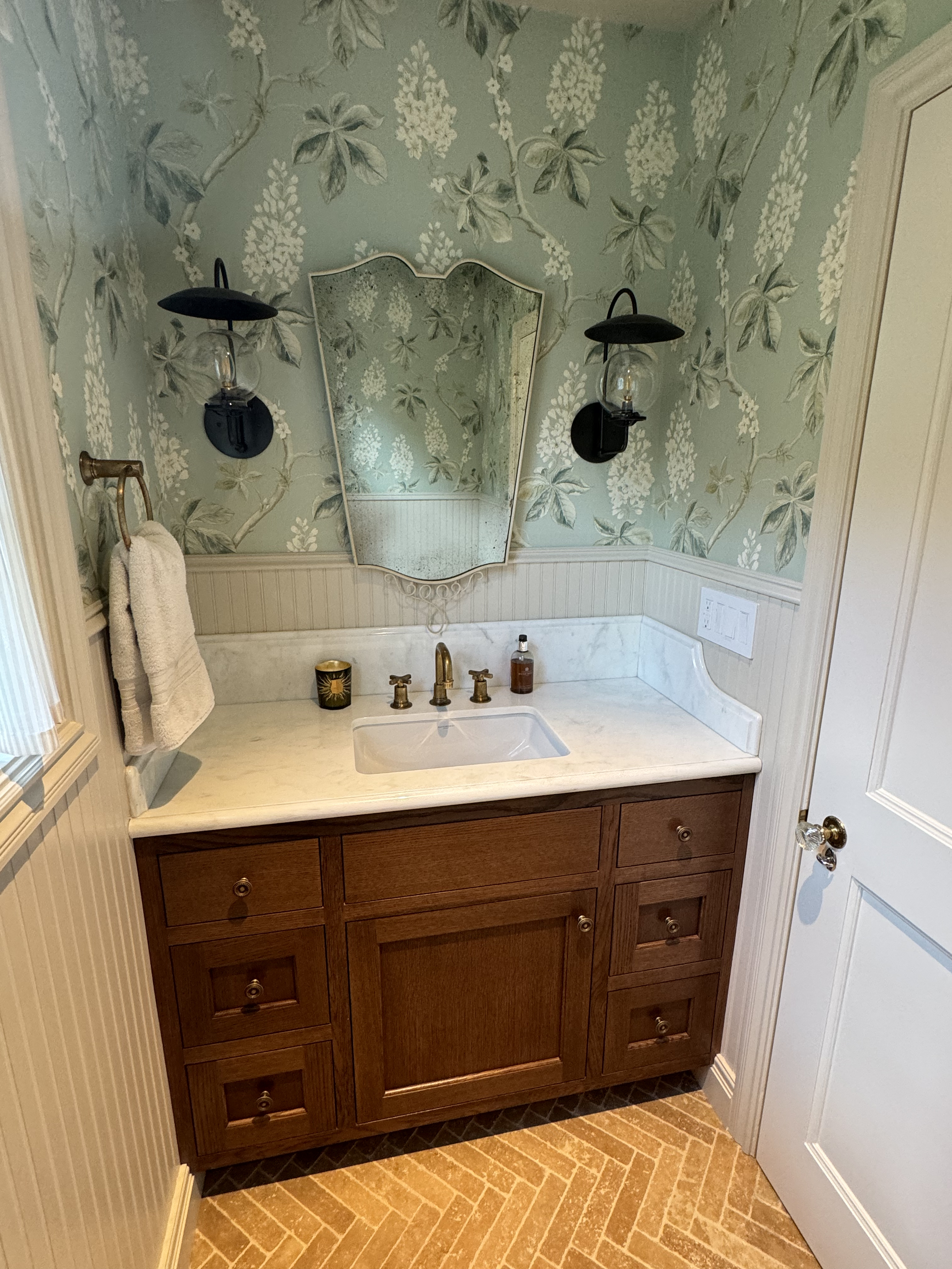 Remodeled bathroom with walk-in shower and custom finishes